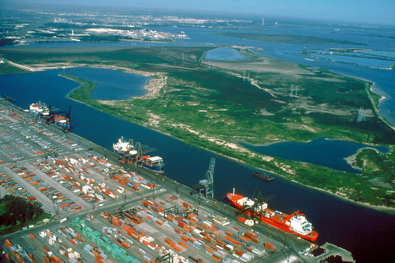 The Barbours Cut Terminal of the Port of Houston, USA. This cargo shipping terminal has a single large wharf with multiple berths.