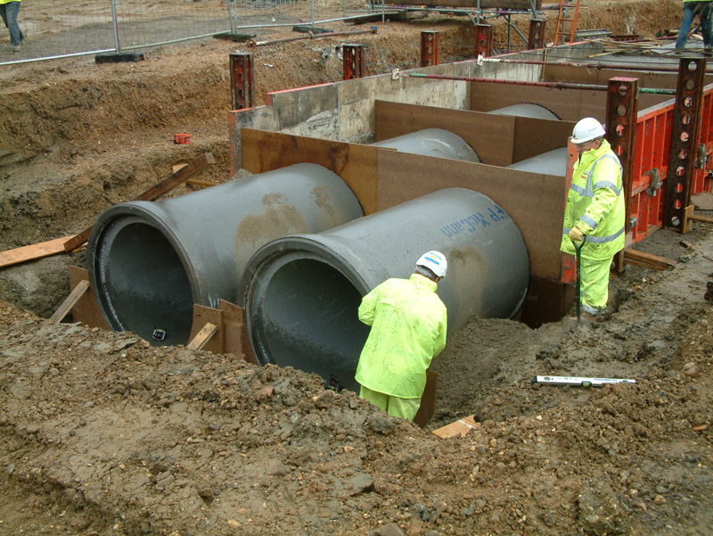 Rigid pipeline system with flexible joints for conveyance of stormwater and storage / attenuation, available with optional dry weather flow channel and side entry manhole access. 