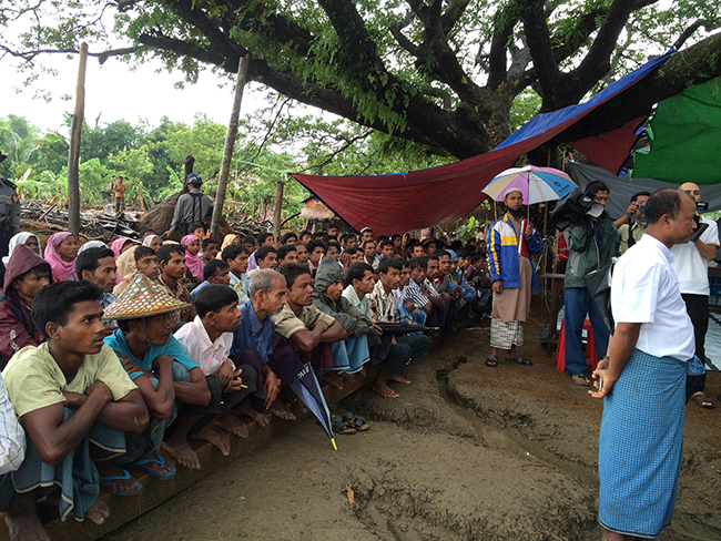 UN officials meet with the population of an affected village in Rakhine state (2015).Credit: FAO/ Bui Thi Lan