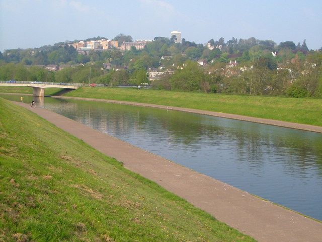 Exe Flood Relief Channel. Looking upstream to the Station Road bridge, with University buildings on the hill behind.
