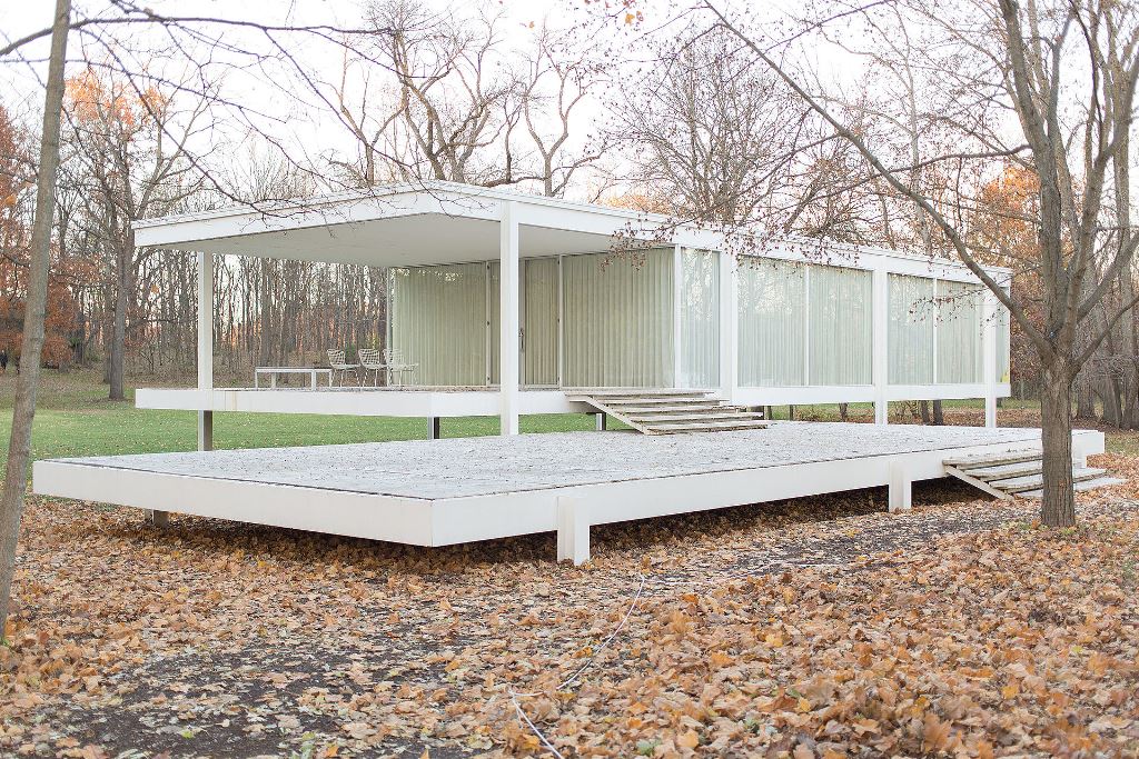 The Farnsworth House by Ludwig Mies van der Rohe between 1945 and 1951. The enclosed space and a screened porch are elevated five feet on a raised floor platform, just slightly above the 100 year flood level